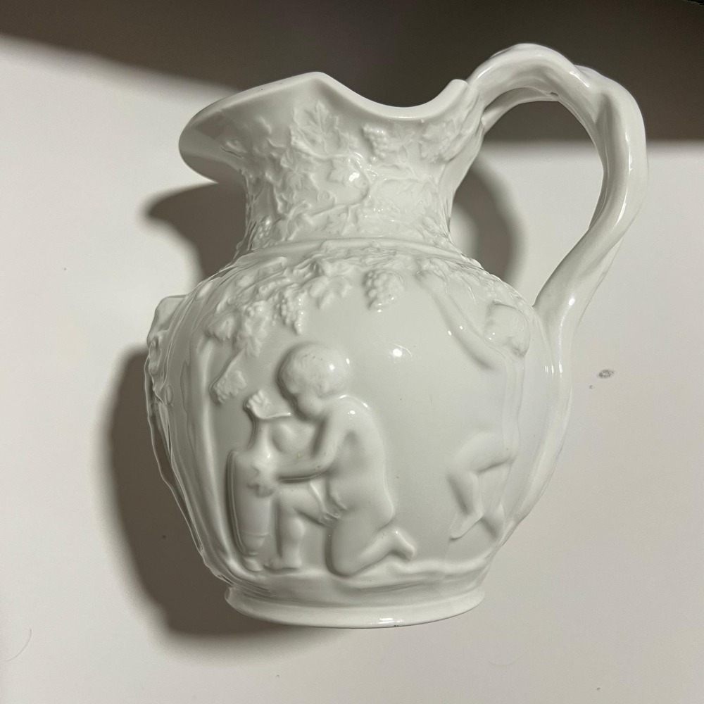 Vintage White Glass Cherub Pitcher Embossed Grape Vine Relief molded Victorian